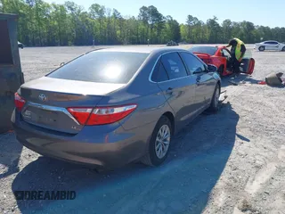 2017 Toyota Camry XLE with VIN 4T1BF1FK2HU279053, listed as a IAAI auction lot 42050455 with 100,896 mi miles. Bid and sale history available at carsss.com. Image 4.