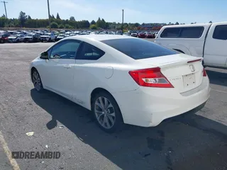 2012 Honda Civic Si with VIN 2HGFG4A57CH700350, listed as a IAAI auction lot 40497785 with 216,824 mi miles and . Bid and sale history available at DreamBid. Image 3.