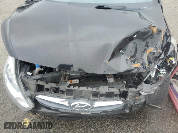 2014 Hyundai Accent GLS z VIN KMHCT4AE6EU705838, wystawiony jako Copart lot #58581515 z przebiegiem 40 265 mil mil oraz Szkoda całkowita • Salvage title. Historia ofert i sprzedaży dostępna na DreamBid. Obrazek 11.