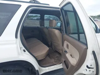 1998 Toyota 4Runner with VIN JT3GM84R5W0031171, listed as a IAAI auction lot 41989920 with 163,296 mi miles. Bid and sale history available at carsss.com. Image 8.