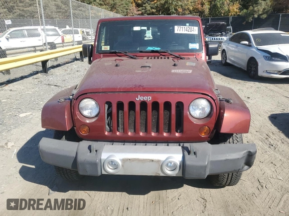 2010 Jeep Wrangler Sahara с VIN 1J4GA5D16AL225139, выставлен на аукционе Copart как лот 77114204 с пробегом Не указан миль и Списание • Salvage title. История ставок и продаж доступна на DreamBid. Изображение 5.