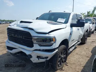 2023 Ram 2500 Laramie with VIN 3C6UR5FL3PG517960, listed as a IAAI auction lot 42128355 with 101,733 mi miles and . Bid and sale history available at DreamBid. Image 2.