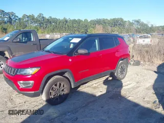 2020 Jeep Compass Trailhawk with VIN 3C4NJDDB6LT220868, listed as a IAAI auction lot 41600066 with 51,151 mi miles and . Bid and sale history available at carsss.com. Image 18.