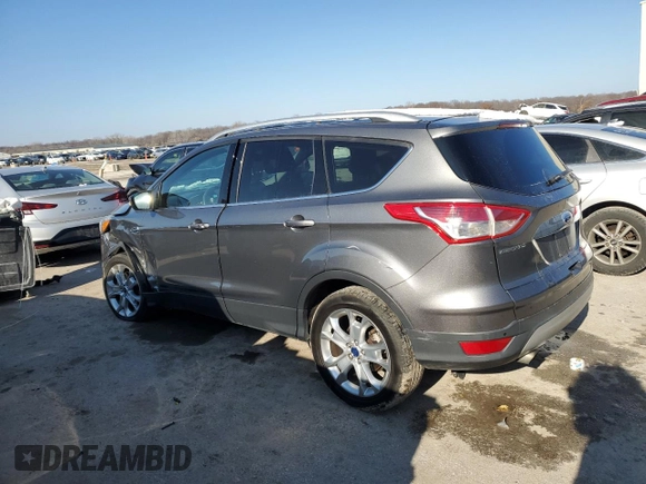 2014 Ford Escape Titanium with VIN 1FMCU9J90EUE48236, listed as a Copart auction lot 85134724 with 64,162 mi miles and Salvage Title. Bid and sale history available at carsss.com. Image 2.