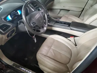 2018 Lincoln MKZ Hybrid Reserve z VIN 3LN6L5MU4JR609844, wystawiony jako Copart lot #70853724 z przebiegiem 107 042 mil mil oraz Szkoda całkowita • Salvage title. Historia ofert i sprzedaży dostępna na DreamBid. Obrazek 7.
