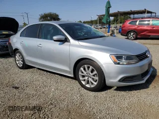 2014 Volkswagen Jetta SE с VIN 3VWD17AJ9EM437088, выставлен на аукционе Copart как лот 64810275 с пробегом 92 165 миль миль и Списание • Salvage title. История ставок и продаж доступна на DreamBid. Изображение 4.