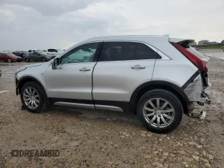 2021 Cadillac XT4 FWD Premium Luxury with VIN 1GYFZCR48MF083164, listed as a Copart auction lot 55377235 with 63,987 mi miles and Salvage title. Bid and sale history available at DreamBid. Image 2.