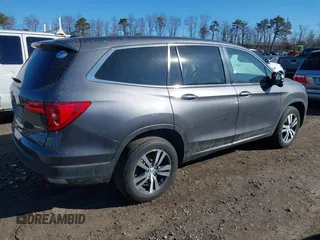 2017 Honda Pilot EX-L with VIN 5FNYF6H59HB101815, listed as a IAAI auction lot 41704661 with 130,479 mi miles and . Bid and sale history available at DreamBid. Image 4.
