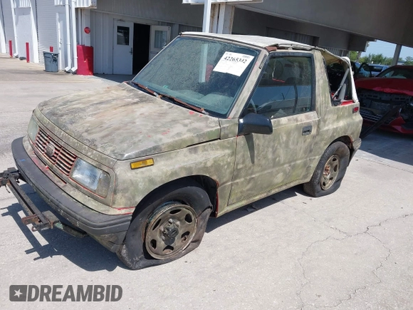 1995 Chevrolet Tracker z VIN 2CNBJ1869S6911342, wystawiony jako IAAI lot #42265392 z przebiegiem 121 944 mil mil oraz . Historia ofert i sprzedaży dostępna na DreamBid. Obrazek 2.