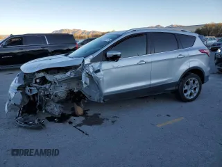 2016 Ford Escape Titanium with VIN 1FMCU9J95GUA69932, listed as a Copart auction lot 88470175 with 108,471 mi miles and Salvage title. Bid and sale history available at DreamBid. Image 1.