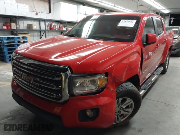 2019 GMC Canyon 2WD SLE z VIN 1GTG5CENXK1137028, wystawiony jako IAAI lot #42374821 z przebiegiem 91 228 mil mil oraz . Historia ofert i sprzedaży dostępna na DreamBid. Obrazek 17.