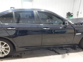 2014 BMW 5 Series 535i xDrive with VIN WBA5B3C58ED531825, listed as a IAAI auction lot 41715275 with 67,782 mi miles and . Bid and sale history available at carsss.com. Image 13.