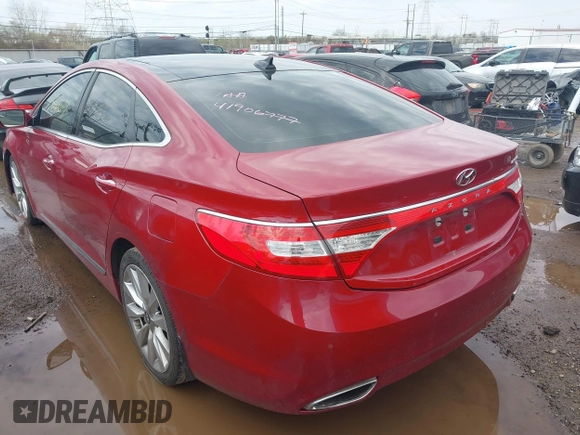 2014 Hyundai Azera Limited with VIN KMHFH4JG9EA419547, listed as a IAAI auction lot 41906777 with 134,100 mi miles and . Bid and sale history available at DreamBid. Image 3.