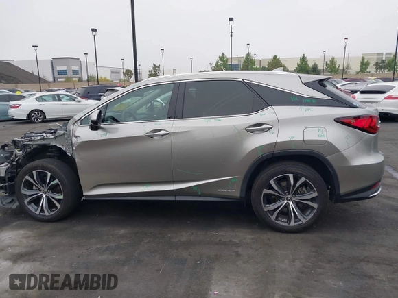 2022 Lexus RX 450h with VIN 2T2HGMDA7NC072735, listed as a IAAI auction lot 42356852 with 62,835 mi miles and . Bid and sale history available at DreamBid. Image 15.