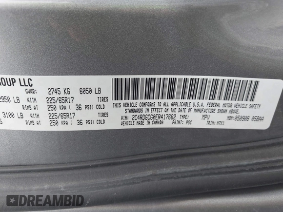 2014 Dodge Grand Caravan SXT with VIN 2C4RDGCG0ER417662, listed as a IAAI auction lot 41933279 with 156,751 mi miles and . Bid and sale history available at DreamBid. Image 9.