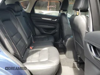 2021 Mazda CX-5 Grand Touring Reserve with VIN JM3KFBAY8M0384498, listed as a Copart auction lot 52013445 with 20,469 mi miles and Salvage Title. Bid and sale history available at carsss.com. Image 12.