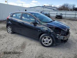 2014 Ford Fiesta SE z VIN 3FADP4EJ5EM182407, wystawiony jako Copart lot #51848425 z przebiegiem 134 347 mil mil oraz Szkoda całkowita • Salvage title. Historia ofert i sprzedaży dostępna na DreamBid. Obrazek 4.