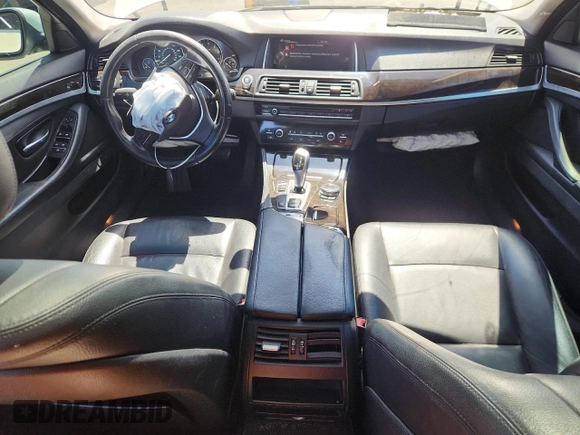 2015 BMW 5 Series 528i with VIN WBA5A5C59FD518341, listed as a Copart auction lot 63881785 with 147,489 mi miles and Salvage title. Bid and sale history available at DreamBid. Image 8.