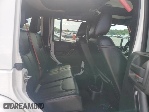 2017 Jeep Wrangler Unlimited Rubicon Recon with VIN 1C4BJWFG7HL696895, listed as a Copart auction lot 57409625 with 50,802 mi miles and Salvage title. Bid and sale history available at DreamBid. Image 10.