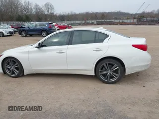 2015 Infiniti Q50 Premium with VIN JN1BV7AP3FM349396, listed as a IAAI auction lot 41793057 with 133,372 mi miles. Bid and sale history available at carsss.com. Image 14.