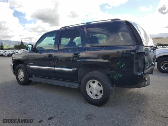 2004 GMC Yukon SLT with VIN 1GKEC13V04J280663, listed as a Copart auction lot 48187845 with 218,293 mi miles and Salvage Title. Bid and sale history available at carsss.com. Image 2.