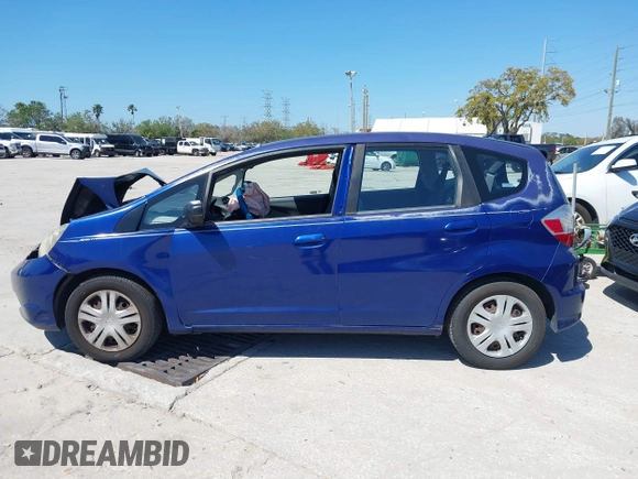 2009 Honda Fit with VIN JHMGE88249S056575, listed as a IAAI auction lot 41702555 with 116,658 mi miles. Bid and sale history available at carsss.com. Image 14.