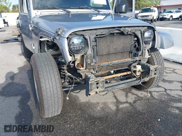 2018 Jeep Wrangler Unlimited Sport S with VIN 1C4HJWDG5JL839703, listed as a IAAI auction lot 42140205 with 61,604 mi miles and . Bid and sale history available at DreamBid. Image 6.