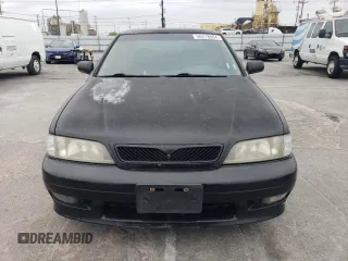 2002 Infiniti G20 Luxury z VIN JNKCP11A52T509703, wystawiony jako Copart lot #56278004 z przebiegiem 222 049 mil mil oraz Szkody całkowita. Historia ofert i sprzedaży dostępna na DreamBid. Obrazek 5.