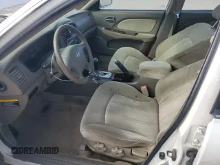 2004 Hyundai Sonata GLS with VIN KMHWF35H34A920659, listed as a Copart auction lot 77813554 with 76,938 mi miles and Clean Title. Bid and sale history available at carsss.com. Image 7.