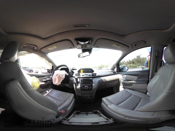 2014 Honda Odyssey Touring with VIN 5FNRL5H94EB057499, listed as a IAAI auction lot 41983956 with 158,573 mi miles and . Bid and sale history available at DreamBid. Image 18.