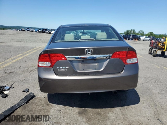 2009 Honda Civic LX z VIN 19XFA16559E020457, wystawiony jako Copart lot #58721185 z przebiegiem Nie podano mil oraz Szkoda całkowita • Salvage title. Historia ofert i sprzedaży dostępna na DreamBid. Obrazek 6.