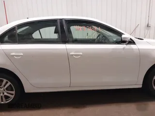 2011 Volkswagen Jetta SE z VIN 3VWDZ7AJ9BM323290, wystawiony jako IAAI lot #41877681 z przebiegiem 115 307 mil mil oraz . Historia ofert i sprzedaży dostępna na DreamBid. Obrazek 14.