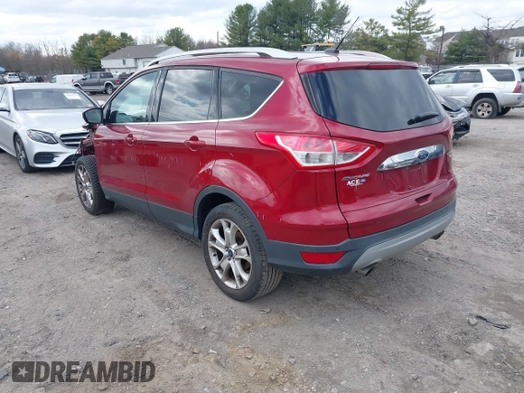 2016 Ford Escape Titanium with VIN 1FMCU9JX2GUA89716, listed as a IAAI auction lot 41899786 with 85,474 mi miles and . Bid and sale history available at DreamBid. Image 3.