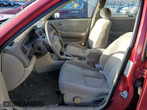 2000 Mazda 626 LX z VIN 1YVGF22CXY5172092, wystawiony jako Copart lot #81960694 z przebiegiem 214 185 mil mil oraz Szkoda całkowita • Salvage title. Historia ofert i sprzedaży dostępna na DreamBid. Obrazek 7.