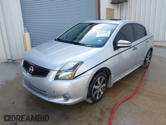 2012 Nissan Sentra SR z VIN 3N1AB6AP9CL619798, wystawiony jako IAAI lot #42382829 z przebiegiem 228 667 mil mil oraz . Historia ofert i sprzedaży dostępna na DreamBid. Obrazek 2.