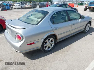 2003 Nissan Maxima SE with VIN JN1DA31D33T513282, listed as a IAAI auction lot 42289710 with 343,973 mi miles and . Bid and sale history available at DreamBid. Image 4.
