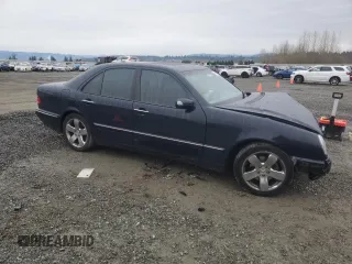 2002 Mercedes-Benz E-Class with VIN WDBJF82J62X063720, listed as a Copart auction lot 84763074 with 0 mi miles and Salvage Title. Bid and sale history available at carsss.com. Image 4.