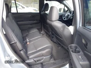 2023 Honda Passport Elite with VIN 5FNYF8H03PB000039, listed as a IAAI auction lot 40593339 with 33,697 mi miles and . Bid and sale history available at DreamBid. Image 8.