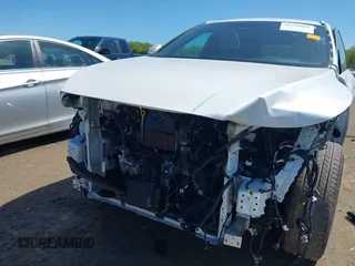 2024 Lexus RX 350 z VIN 2T2BAMCA7RC074242, wystawiony jako IAAI lot #42220864 z przebiegiem 4 544 mil mil oraz . Historia ofert i sprzedaży dostępna na DreamBid. Obrazek 6.
