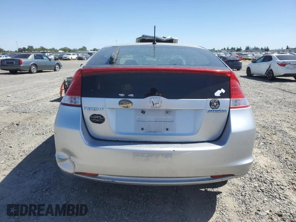2010 Honda Insight LX z VIN JHMZE2H54AS003234, wystawiony jako Copart lot #56915385 z przebiegiem 320 644 mil mil oraz Czysty tytuł • Clean title. Historia ofert i sprzedaży dostępna na DreamBid. Obrazek 6.
