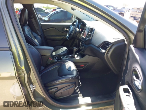 2019 Jeep Cherokee Trailhawk Elite with VIN 1C4PJMBN7KD287506, listed as a IAAI auction lot 42072589 with 108,034 mi miles and . Bid and sale history available at DreamBid. Image 5.