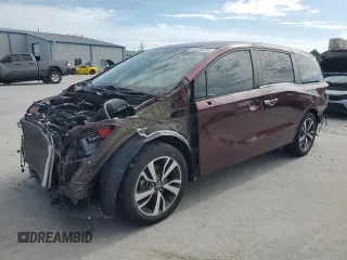 2021 Honda Odyssey Touring z VIN 5FNRL6H87MB006932, wystawiony jako Copart lot #57658245 z przebiegiem 69 222 mil mil oraz Szkoda całkowita • Salvage title. Historia ofert i sprzedaży dostępna na DreamBid. Obrazek 1.