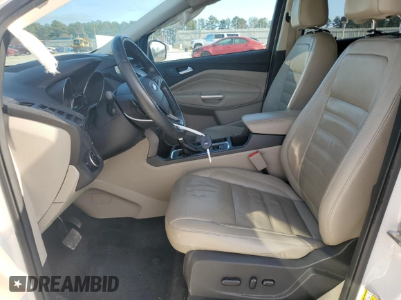 2017 Ford Escape SE with VIN 1FMCU0GD6HUB48986, listed as a Copart auction lot 43915415 with 122,465 mi miles and Salvage Title. Bid and sale history available at DreamBid. Image 7.