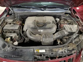 2015 Jeep Grand Cherokee Summit with VIN 1C4RJFJG2FC664245, listed as a Copart auction lot 54131515 with 141,605 mi miles and Salvage Title. Bid and sale history available at DreamBid. Image 12.