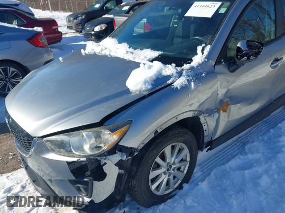 2013 Mazda CX-5 Touring with VIN JM3KE2CE7D0129623, listed as a IAAI auction lot 41344623 with 147,025 mi miles. Bid and sale history available at carsss.com. Image 6.