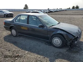 1993 Honda Accord LX with VIN 1HGCB755XPA191159, listed as a Copart auction lot 69899214 with 227,026 mi miles and Salvage Title. Bid and sale history available at carsss.com. Image 4.