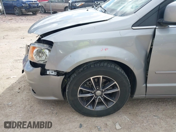 2017 Dodge Grand Caravan SXT with VIN 2C4RDGCG6HR671199, listed as a IAAI auction lot 42031157 with 99,189 mi miles and . Bid and sale history available at DreamBid. Image 17.