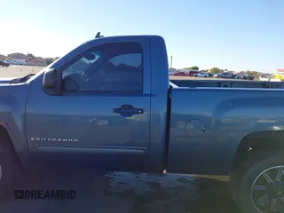 2009 Chevrolet Silverado 1500 with VIN 1GCEC24039Z215240, listed as a IAAI auction lot 41308199 with 104,662 mi miles and . Bid and sale history available at DreamBid. Image 14.