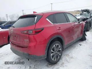 2022 Mazda CX-5 2.5 S Premium Package with VIN JM3KFBDM0N1628116, listed as a IAAI auction lot 41455990 with 29,911 mi miles. Bid and sale history available at carsss.com. Image 4.