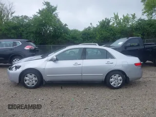2003 Honda Accord LX z VIN 1HGCM56363A140358, wystawiony jako IAAI lot #42365056 z przebiegiem 202 238 mil mil oraz . Historia ofert i sprzedaży dostępna na DreamBid. Obrazek 14.